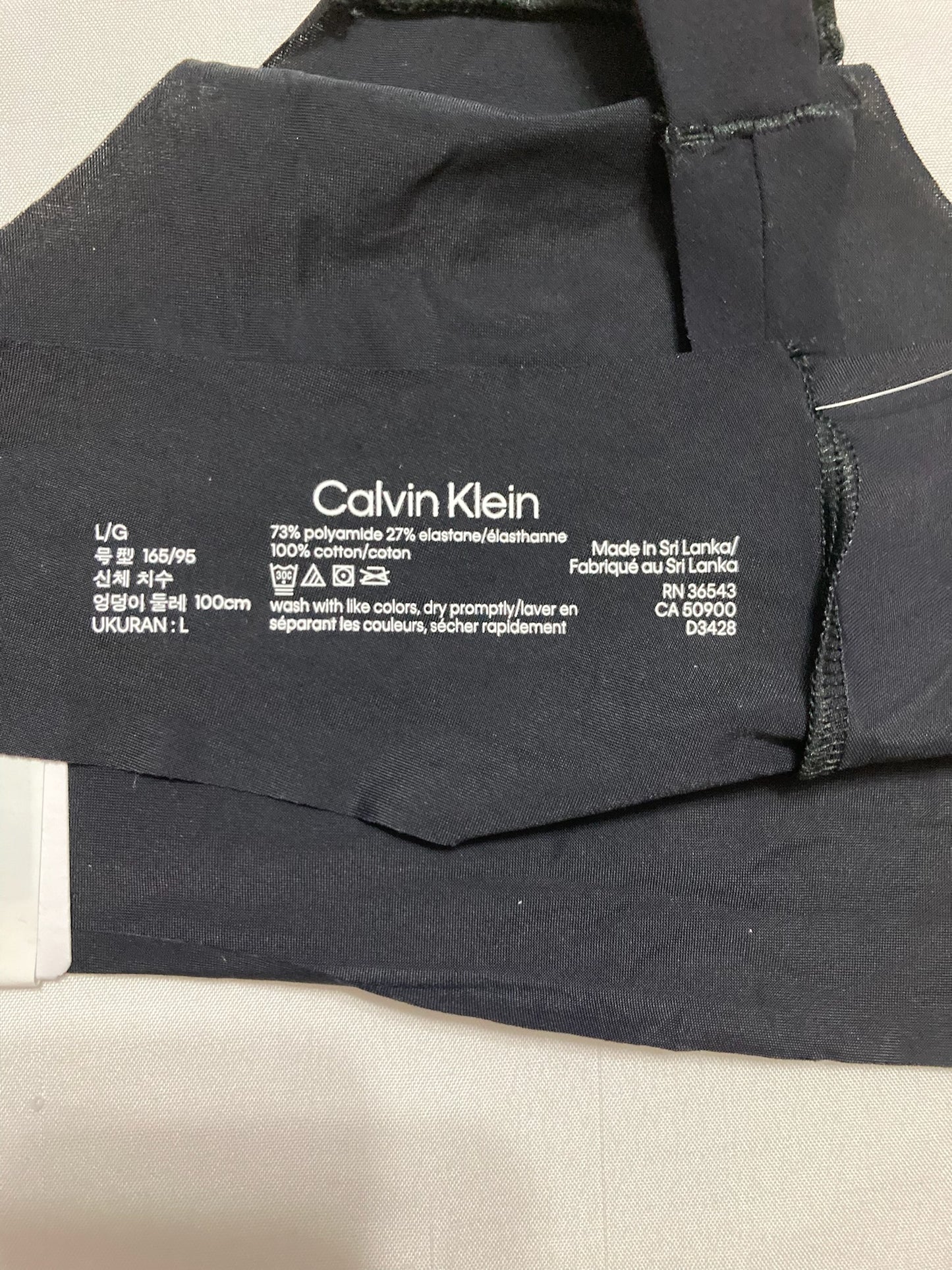 Calvin Klein Women's Invisibles Seamless Thong Panty Black L