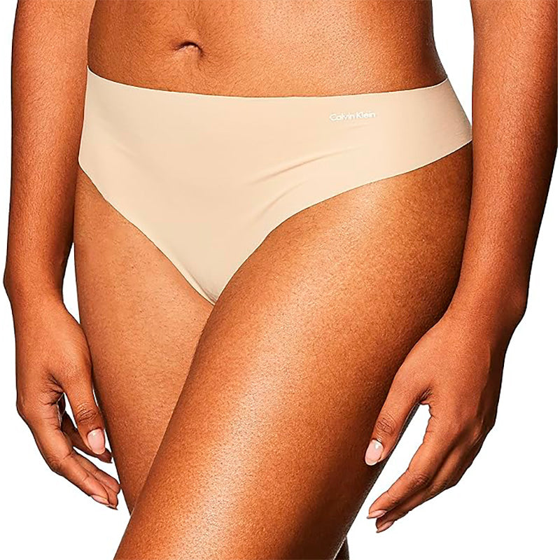Calvin Klein Women's Invisibles Seamless Thong Panty Light Caramel S