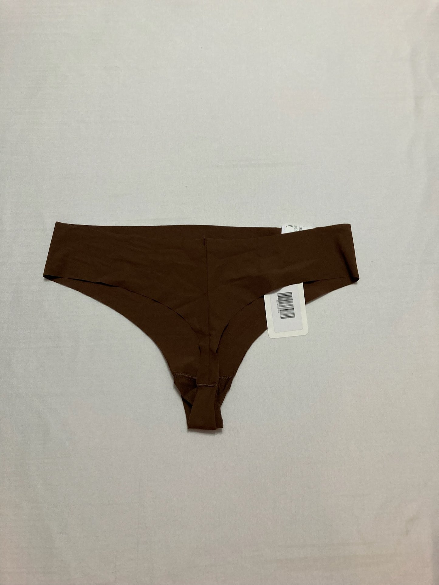 Calvin Klein Women's Invisibles Seamless Thong Pant Chestnut XL