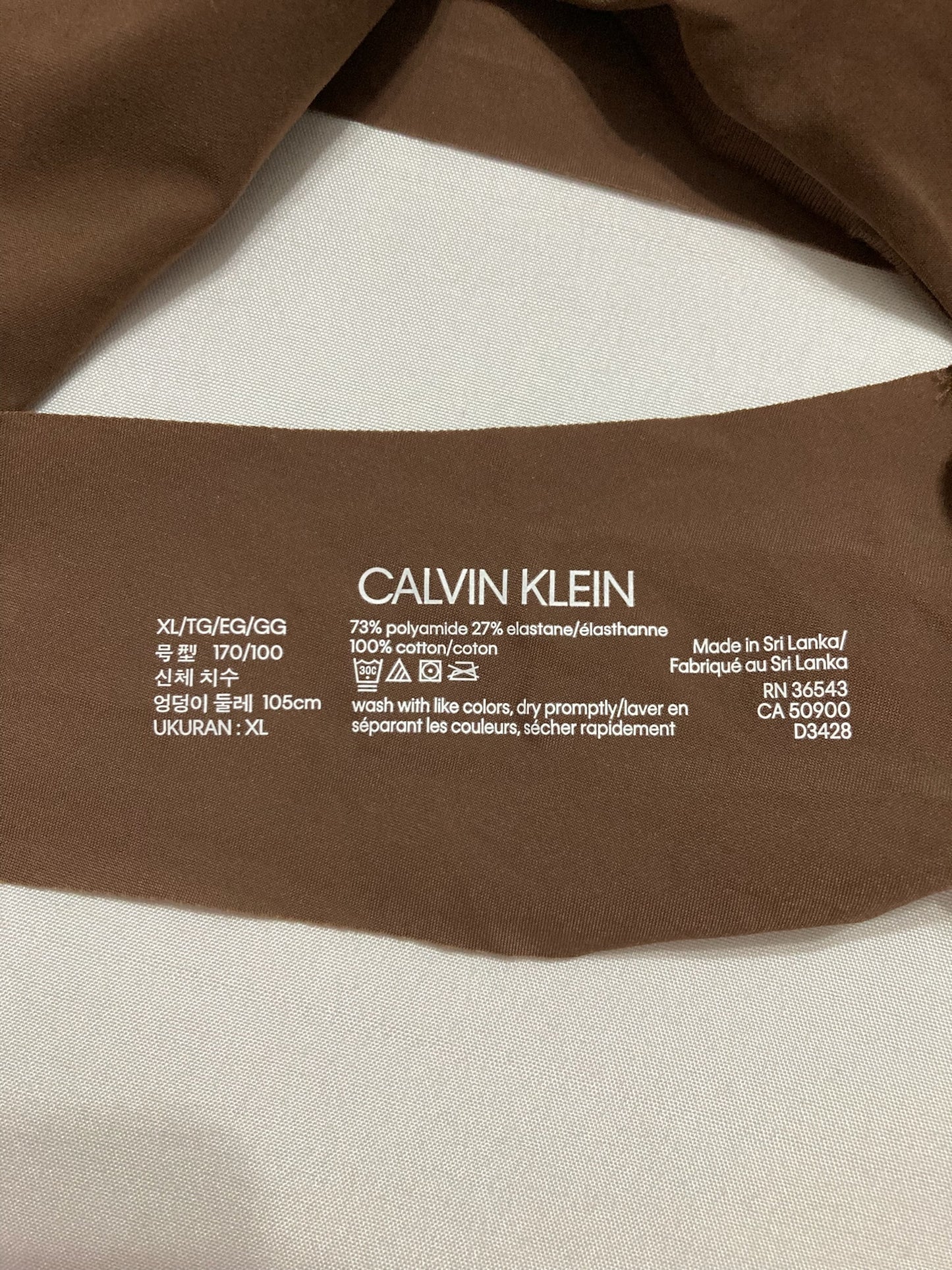 Calvin Klein Women's Invisibles Seamless Thong Pant  Chestnut XL